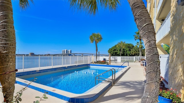 145 N Halifax Ave Unit 711, Daytona Beach, FL 32118 - view of pool with a patio area and a water view