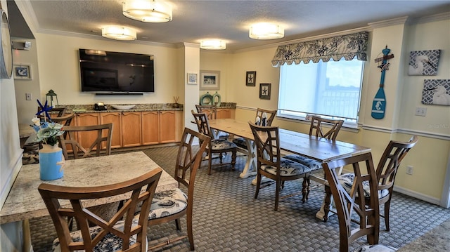 145 N Halifax Ave Unit 711, Daytona Beach, FL 32118 - carpeted dining room with ornamental molding and a textured ceiling