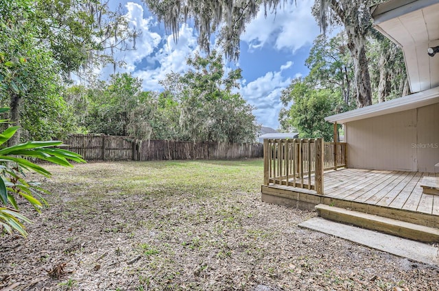 view of yard with a deck