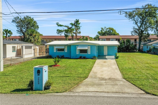 ranch-style house with a front yard