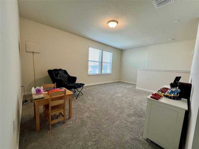 sitting room featuring baseboards, a textured ceiling, visible vents, and carpet flooring