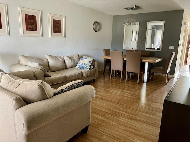 living room with wood-type flooring