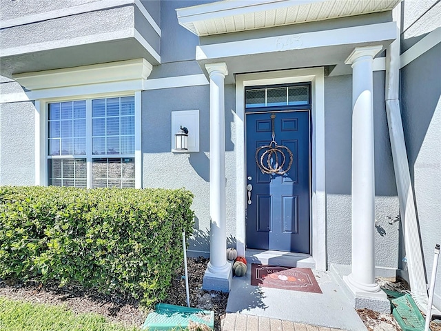 property entrance with covered porch