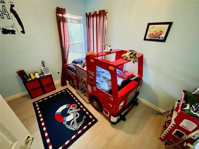 bedroom featuring hardwood / wood-style flooring