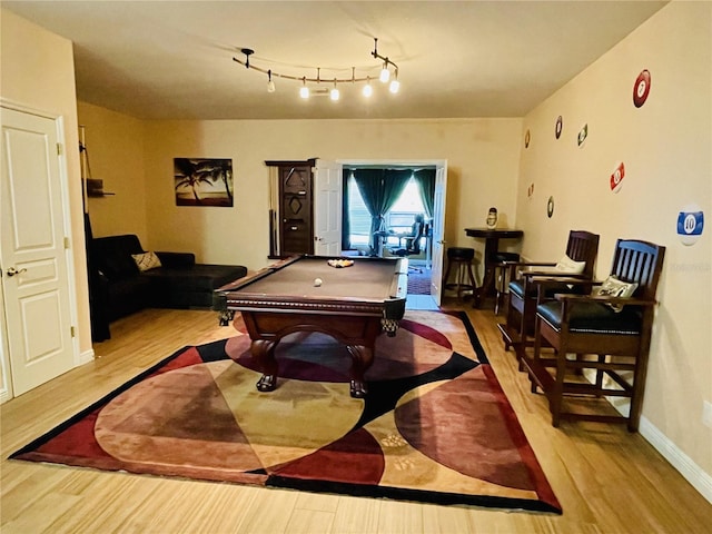 rec room with light wood-type flooring and pool table