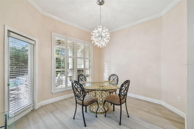 dining area with a chandelier, wood finish floors, and crown molding