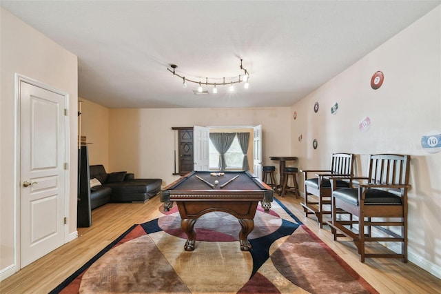 recreation room with light wood finished floors, billiards, and baseboards