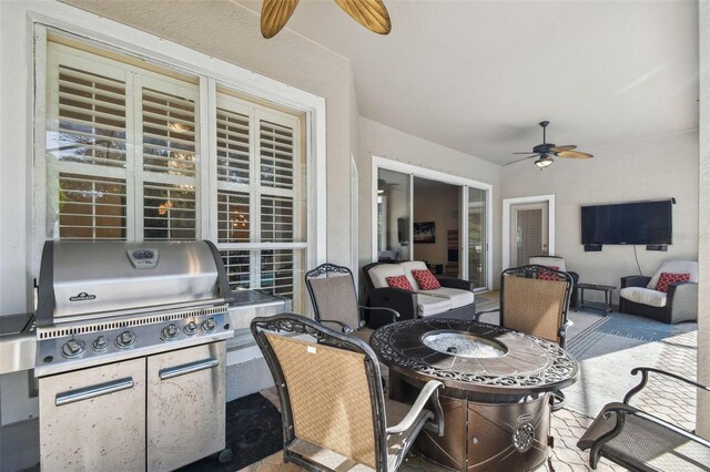 view of patio / terrace featuring ceiling fan