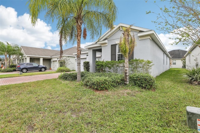 view of front of home with a front lawn