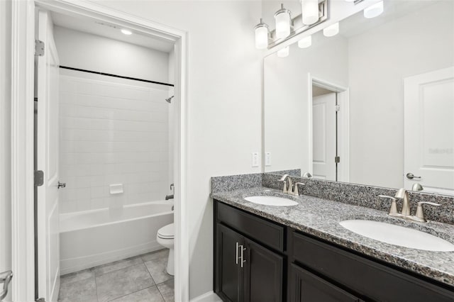 full bathroom featuring tile patterned floors, vanity, shower / bathtub combination, and toilet