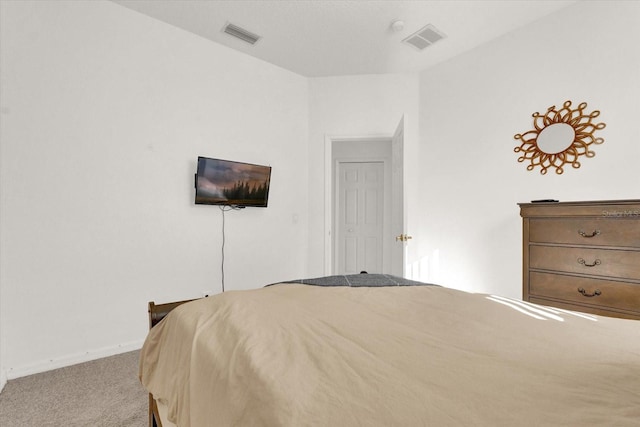 bedroom featuring light colored carpet