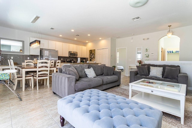 living room featuring light tile patterned floors