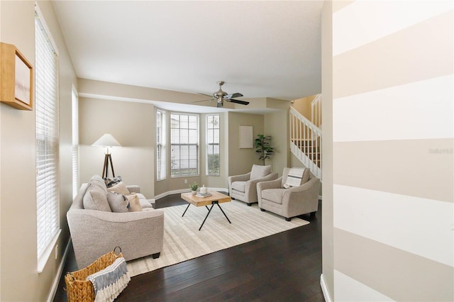 living room with ceiling fan and wood-type flooring