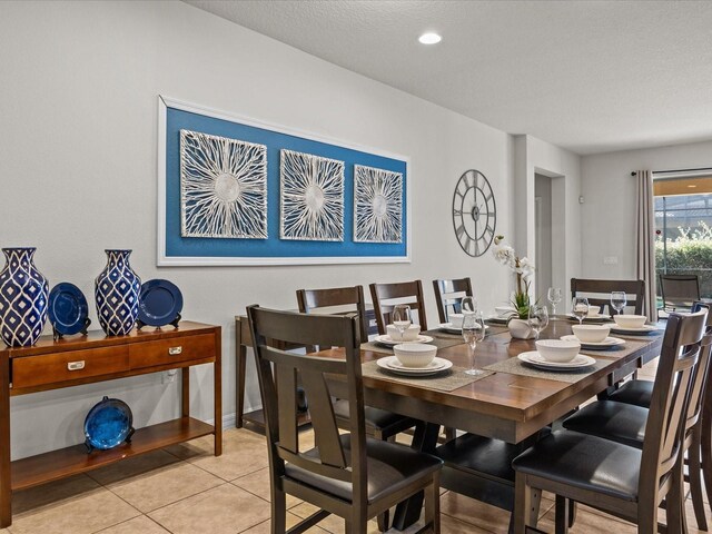 8832 Macapa Dr, Kissimmee, FL 34747 - dining area featuring light tile patterned floors