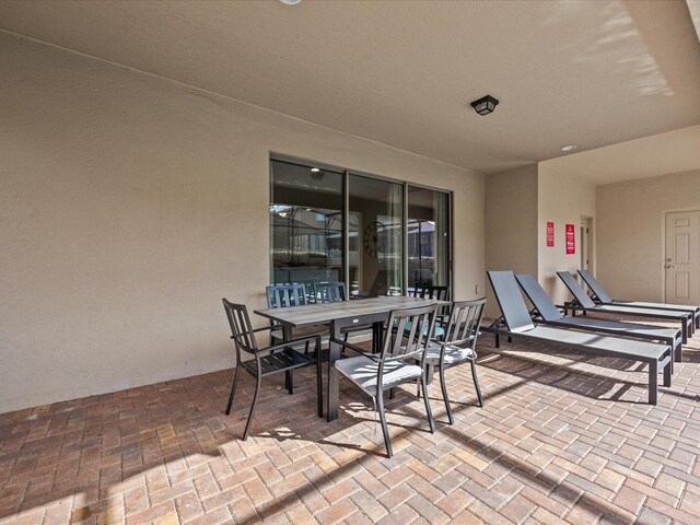 8832 Macapa Dr, Kissimmee, FL 34747 - view of patio / terrace featuring outdoor dining space