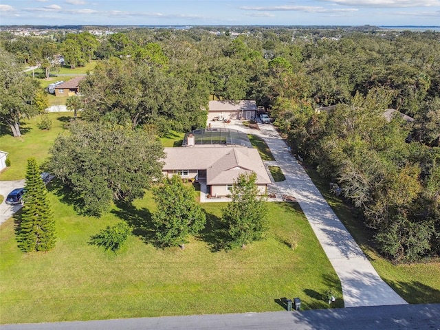 bird's eye view featuring a view of trees