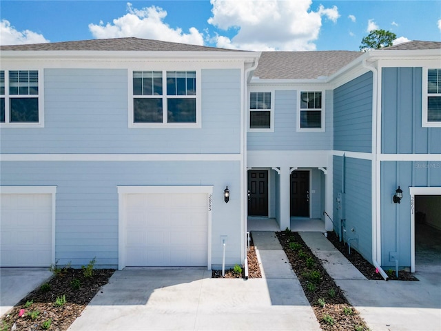 view of property featuring a garage