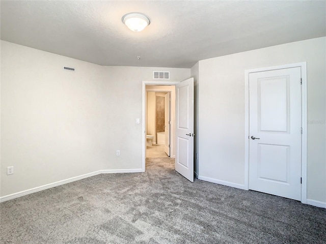 unfurnished bedroom featuring carpet