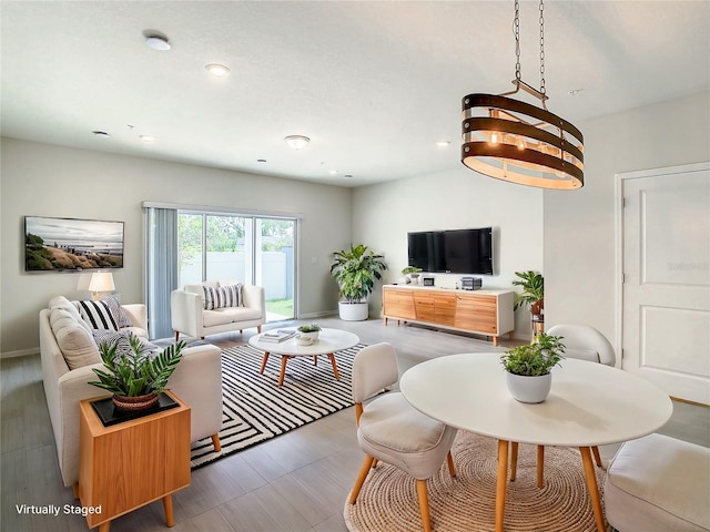 living room featuring a chandelier