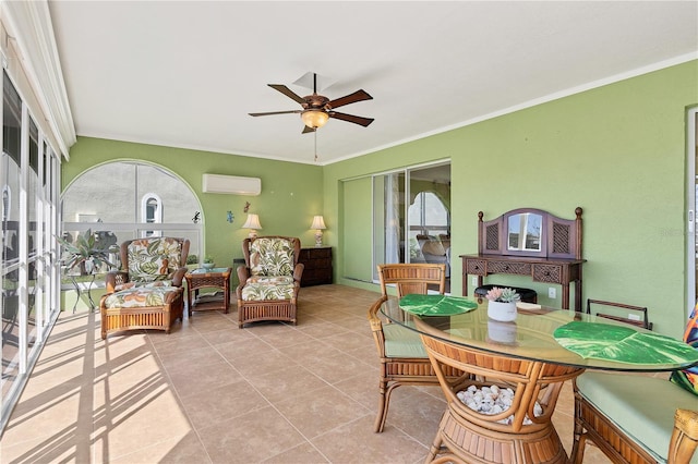 sunroom / solarium featuring ceiling fan and an AC wall unit