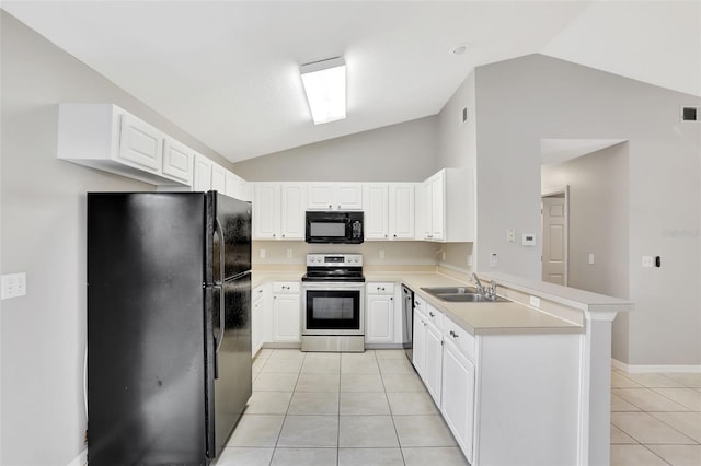 kitchen featuring kitchen peninsula, sink, black appliances, vaulted ceiling, and white cabinets