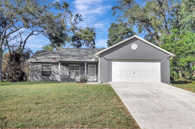 ranch-style home featuring a front lawn and a garage