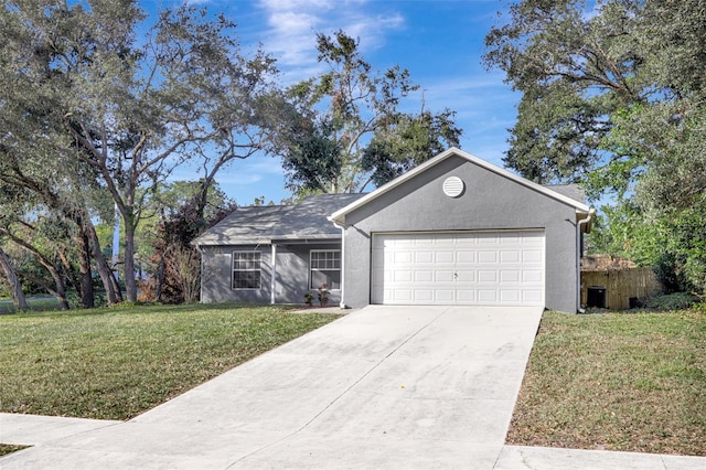 ranch-style house with a garage and a front yard