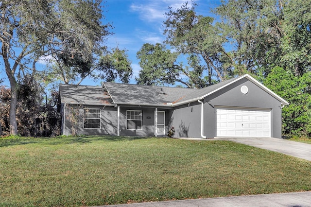 ranch-style house featuring a front yard and a garage