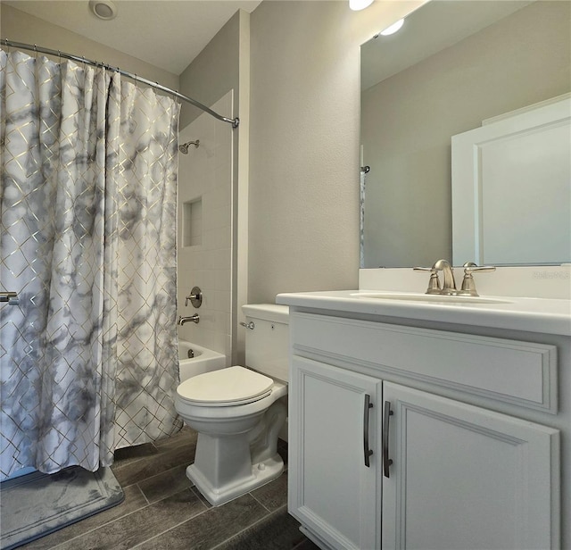 full bathroom featuring vanity, toilet, shower / bath combo, and hardwood / wood-style floors