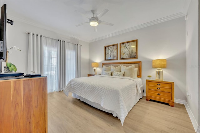 bedroom with ceiling fan, ornamental molding, and light wood-type flooring