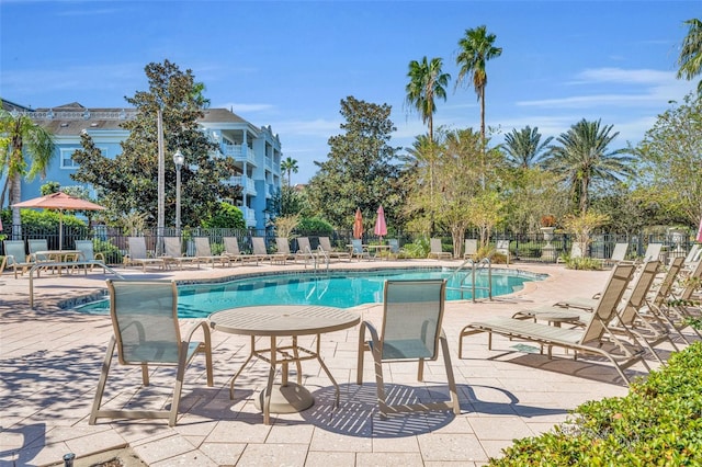 view of pool featuring a patio area