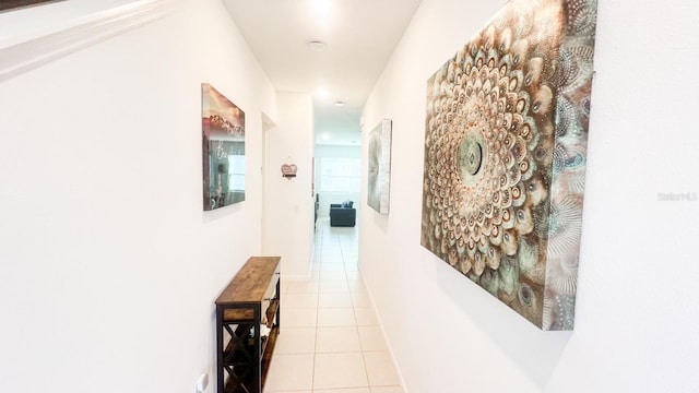 hallway featuring light tile patterned floors