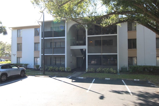 view of building exterior featuring central AC unit