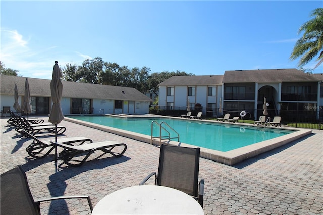8209 Sun Spring Cir Unit 22, Orlando, FL 32825 - view of swimming pool with a patio