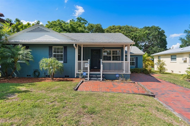 view of front facade featuring a front lawn and a porch