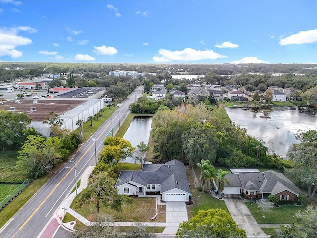 aerial view with a water view and a residential view