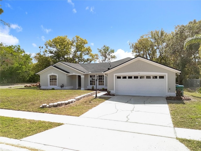 790 Silhouette Ct, Longwood, FL 32750 - single story home featuring a garage, concrete driveway, a front yard, and stucco siding