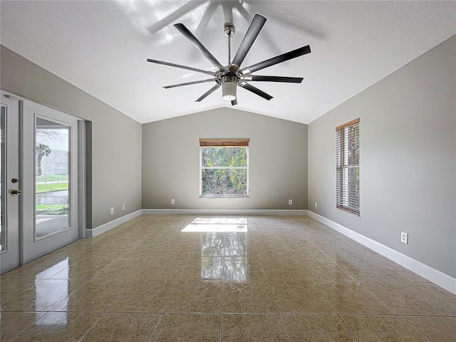 790 Silhouette Ct, Longwood, FL 32750 - tiled empty room with lofted ceiling, ceiling fan, baseboards, and a textured ceiling