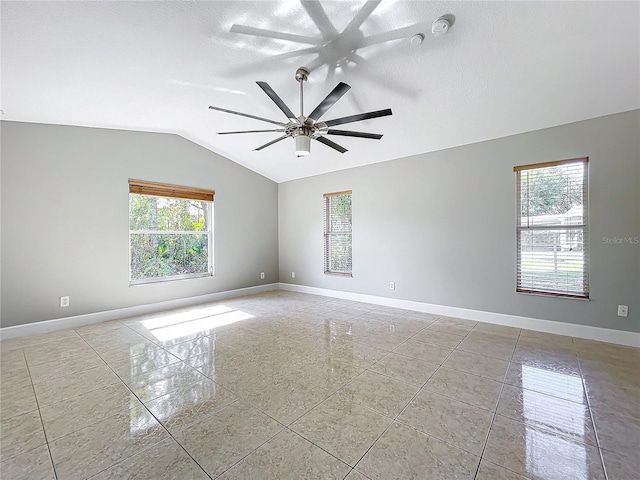 790 Silhouette Ct, Longwood, FL 32750 - spare room with healthy amount of natural light, vaulted ceiling, baseboards, a ceiling fan, and a textured ceiling