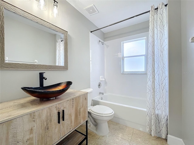 bathroom featuring visible vents, toilet, shower / bath combo with shower curtain, vanity, and tile patterned floors