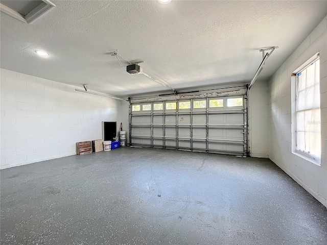 790 Silhouette Ct, Longwood, FL 32750 - garage with a garage door opener and concrete block wall