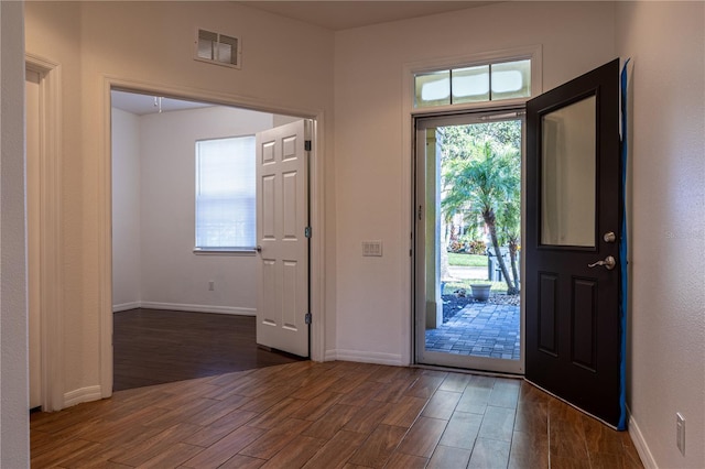 foyer featuring dark hardwood / wood-style floors