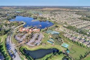 bird's eye view with a water view