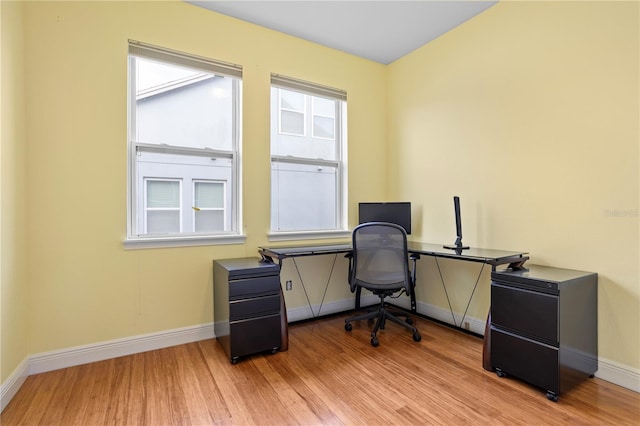 home office featuring light wood-type flooring