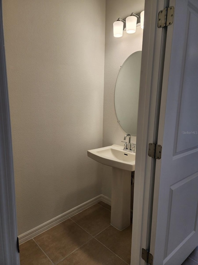 bathroom with tile patterned flooring