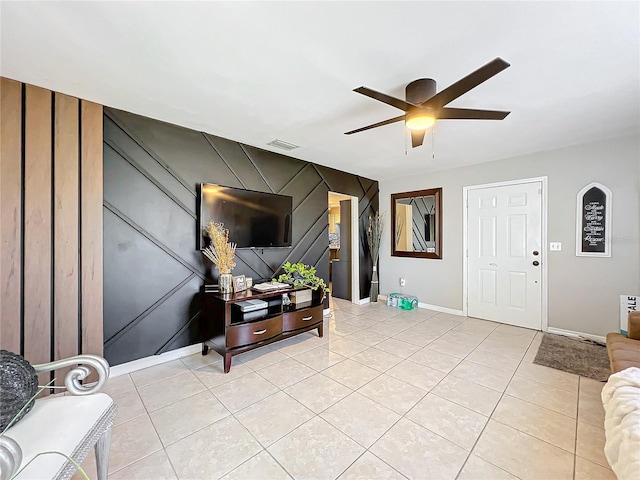 interior space featuring ceiling fan