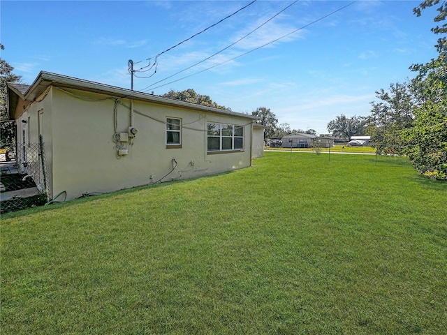 exterior space with a yard