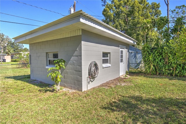 view of outdoor structure featuring a yard