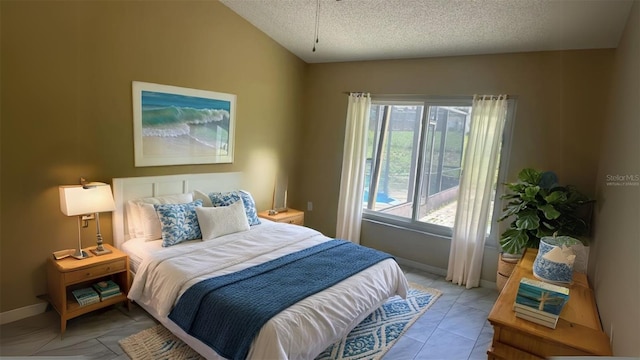 2204 Clementine Trl, Clermont, FL 34714 - bedroom featuring a textured ceiling and baseboards