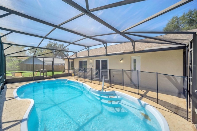 2204 Clementine Trl, Clermont, FL 34714 - outdoor pool featuring a patio and glass enclosure